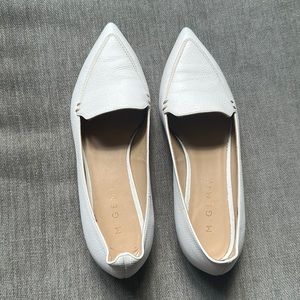 Never worn, soled, flat leather white shoes